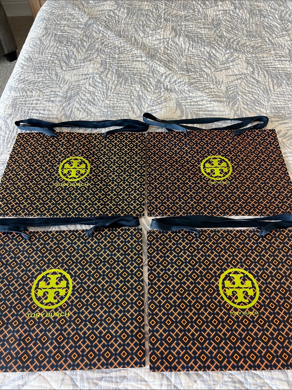 Tory Burch Black and Orange Patterned Gift Bags with Neon Yellow Logo - Set of 4